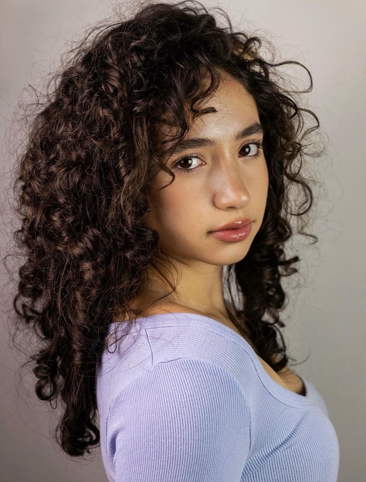 Catherine Bazizi, purple studio headshot
