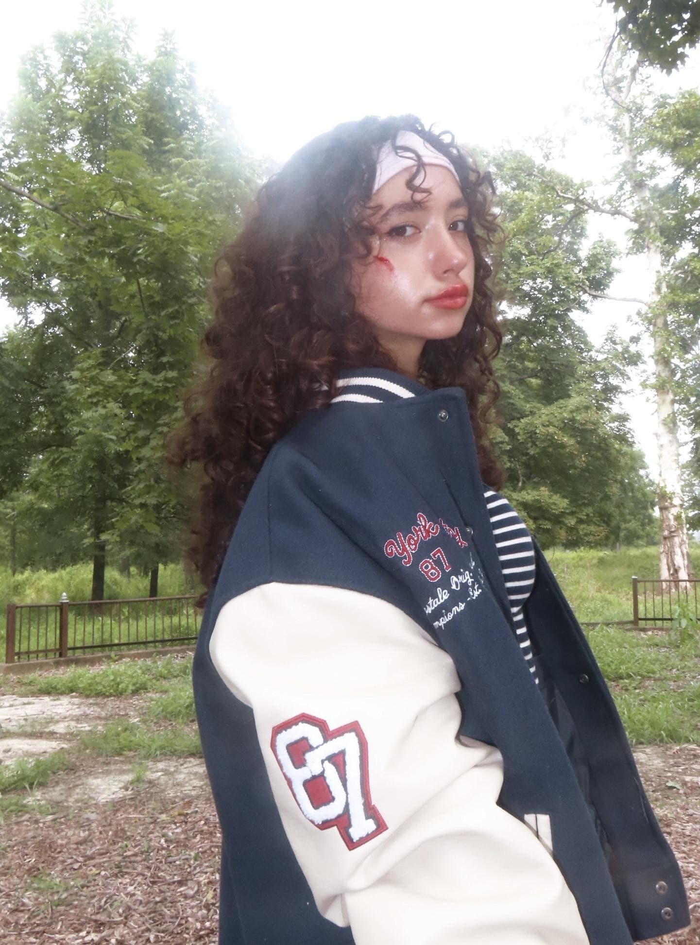 Catherine Bazizi, varsity jacket portrait